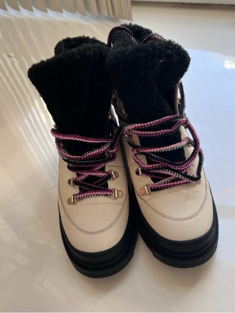 CHANEL Cream Combat Boots with Black Accents